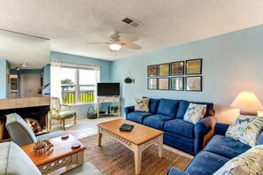 Appartement | Woonkamer | Een flatscreentelevisie