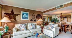 Condo | Living room | 32-inch flat-screen TV with cable channels, TV - C116-amelia-surf-and-racquet (Fernandina Beach)
