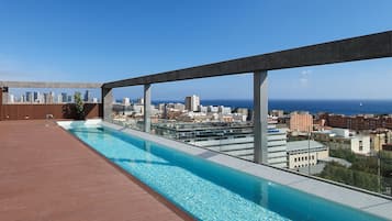 Seasonal outdoor pool, pool loungers