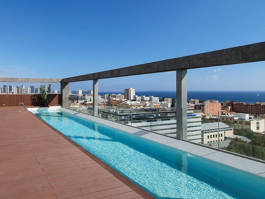 Seasonal outdoor pool, pool loungers