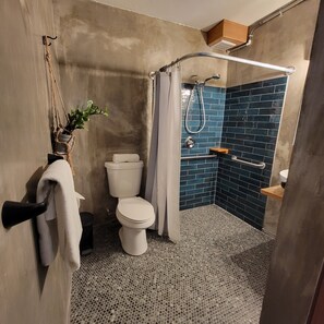 Shower, hydromassage showerhead, towels