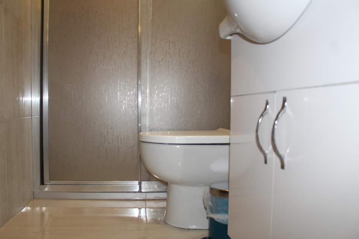 Bathroom | Hair dryer, slippers, towels, soap