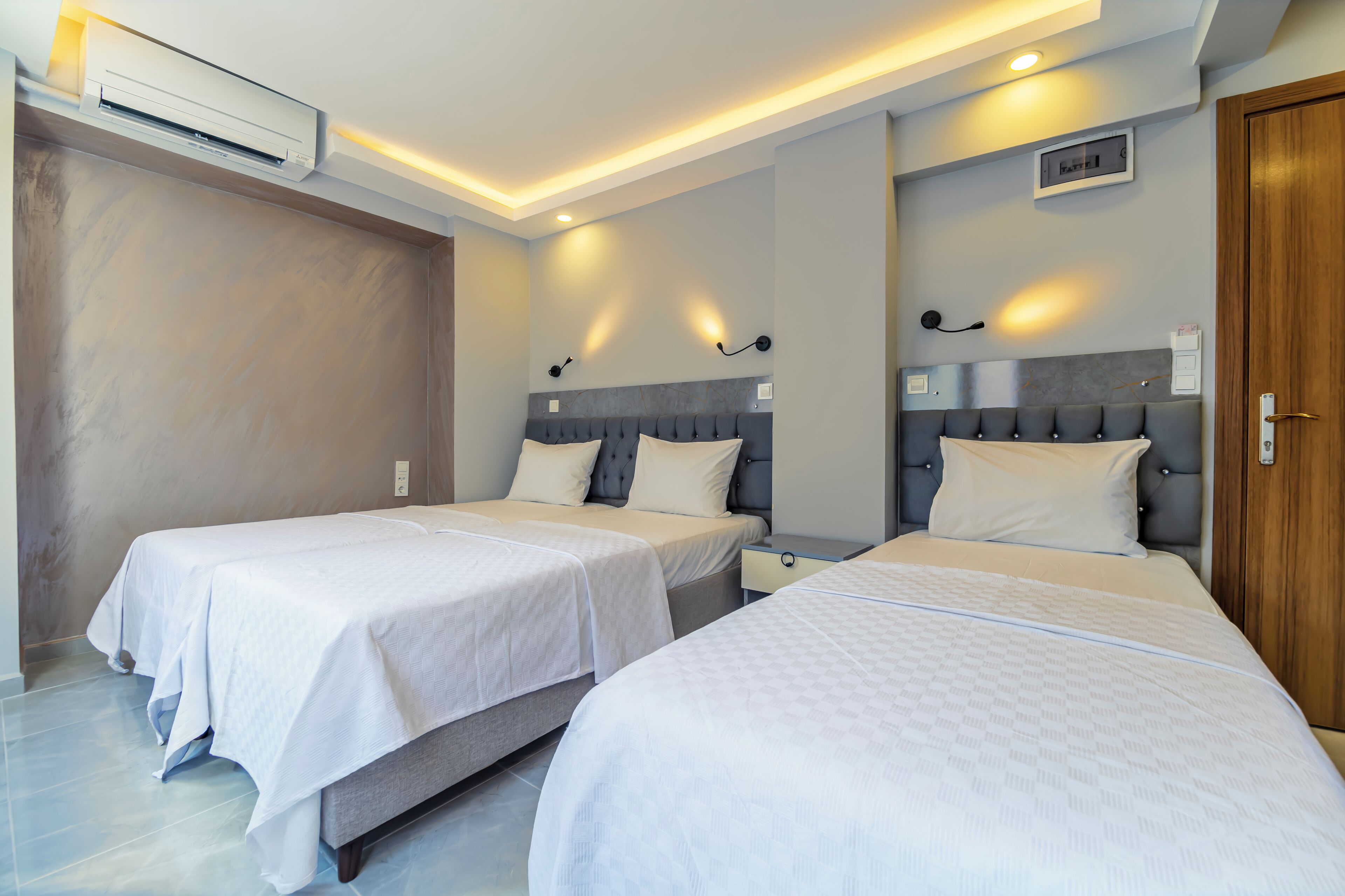 Basic Triple Room | Premium bedding, minibar, desk, blackout drapes