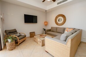 Condo (3BR/2.5BA Designer Condo in Beachfron) | Living room | Flat-screen TV - 3br/2.5ba Designer Condo in Beachfront Community (Jacó)