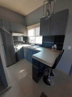 Suíte exclusiva | Cozinha privada