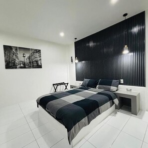 ห้องเอ็กเซกคิวทีฟ | เครื่องนอนระดับพรีเมียม, พื้นที่ทำงานแบบใช้แล็ปท็อป, ผ้าปูที่นอน