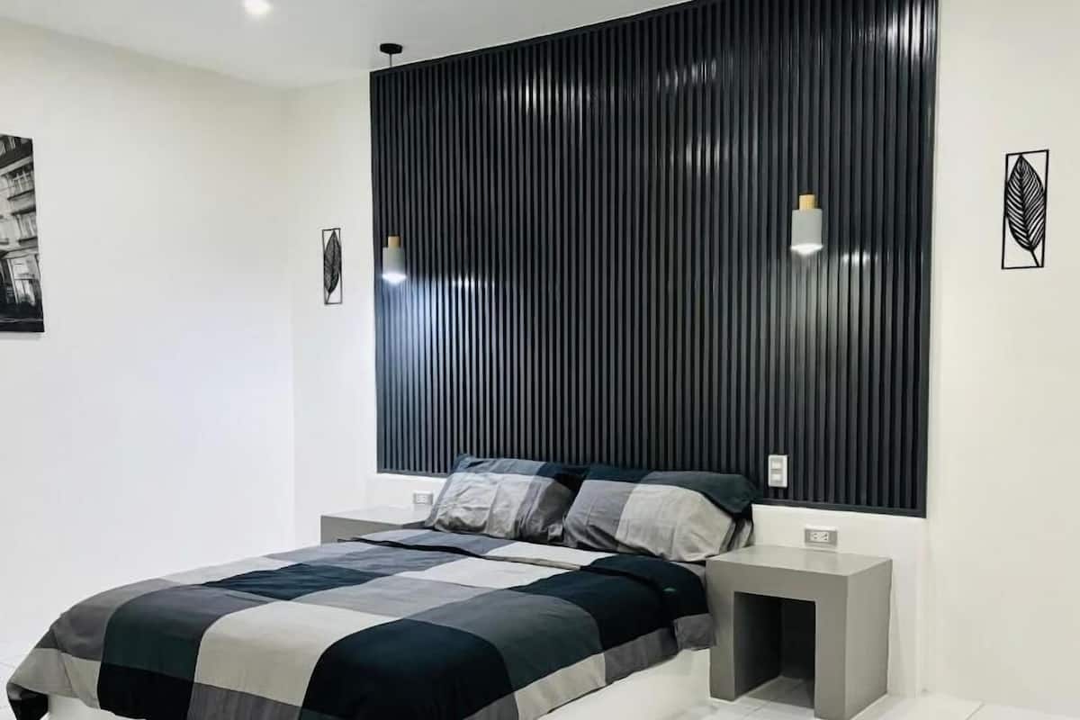 Premium bedding, laptop workspace, bed sheets