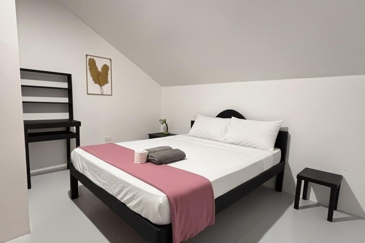 Premium bedding, laptop workspace, bed sheets
