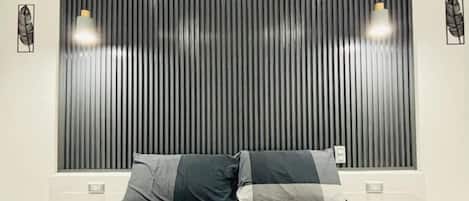 Premium bedding, laptop workspace, bed sheets