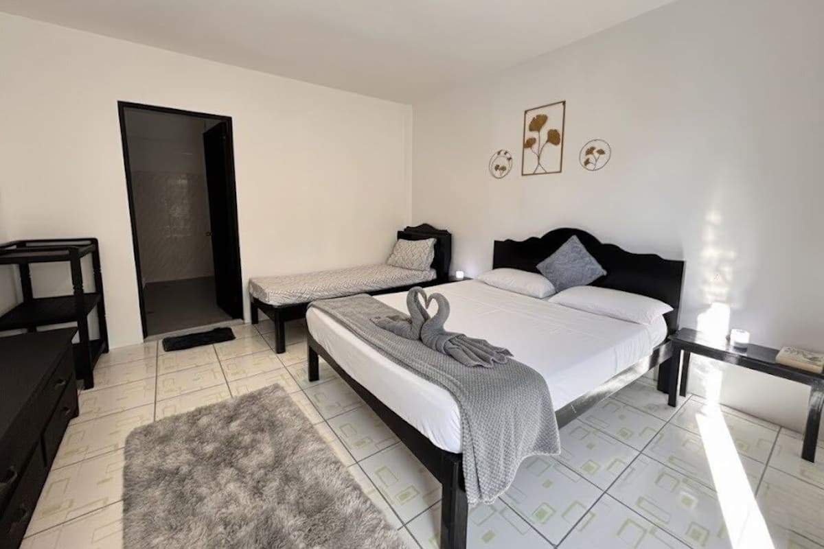 Premium bedding, laptop workspace, bed sheets