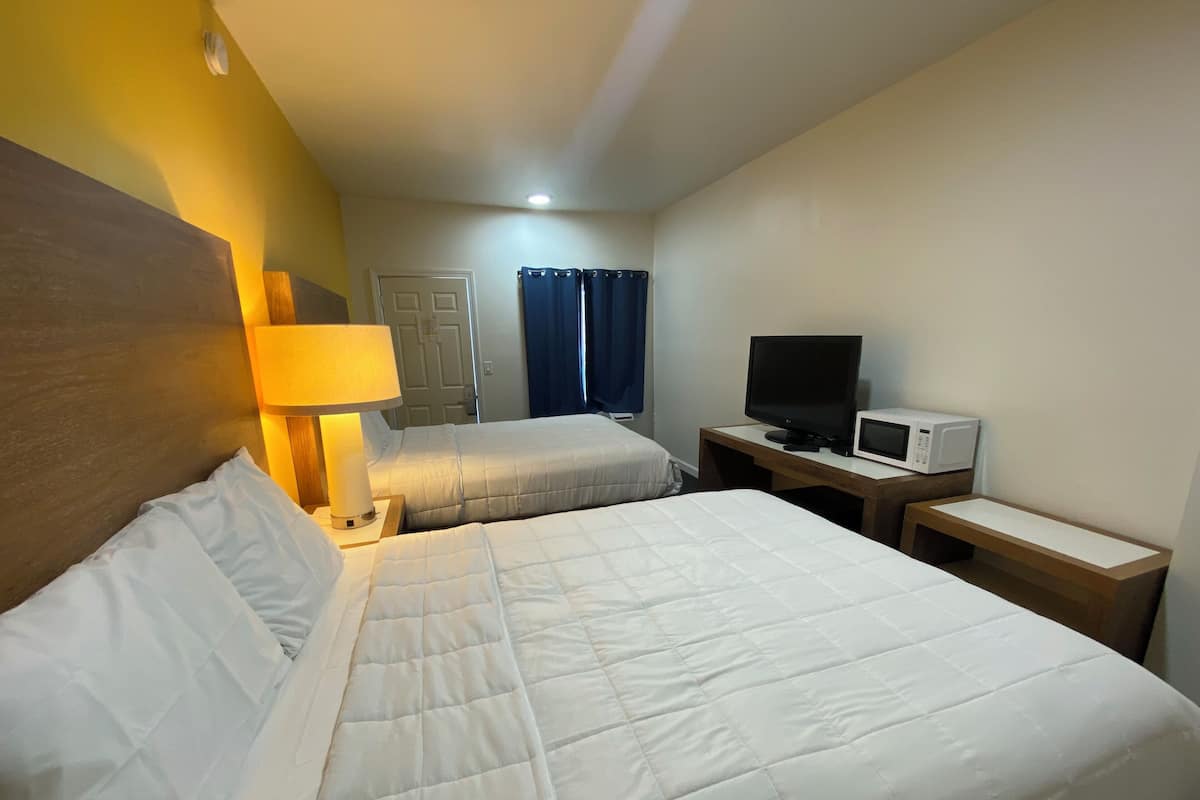 Premium bedding, down duvets, pillow-top beds, blackout curtains
