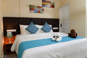 Roupas de cama premium, edredons de pluma, frigobar, cofres nos quartos