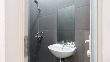 Shower, free toiletries, towels, soap