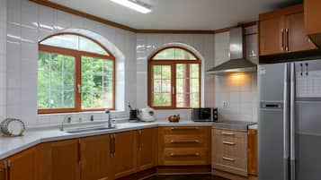 Casa | Cucina condivisa | Frigorifero nell'area comune, forno a microonde nell'area comune