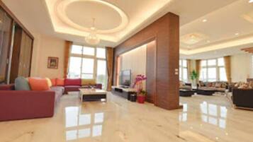 House (Flagship Property) | Living room | Flat-screen TV