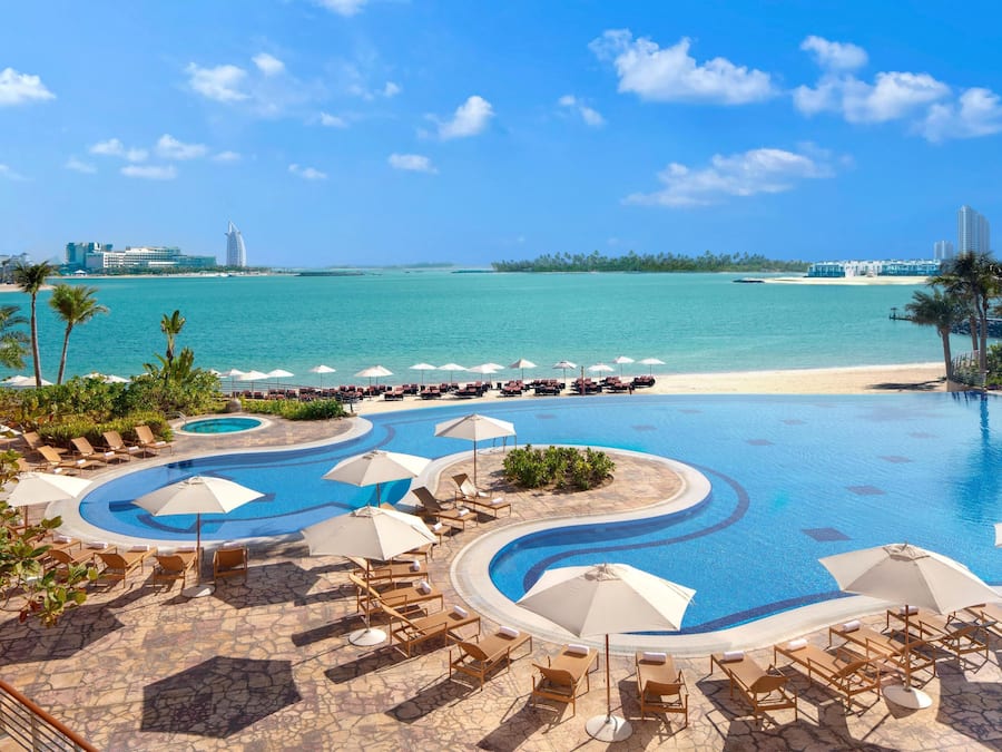 2 outdoor pools, an infinity pool, open 8:30 AM to 8:00 PM, free cabanas