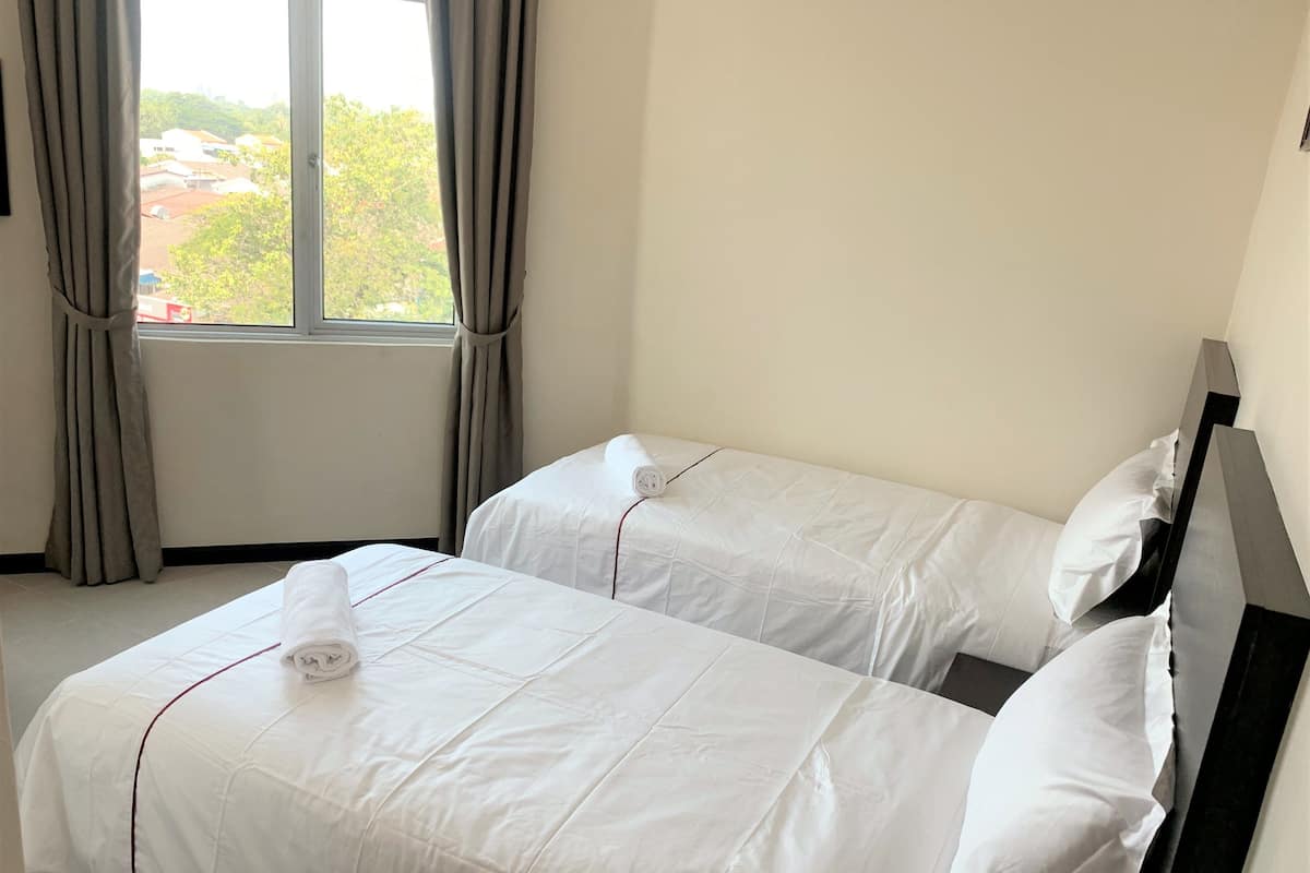 Deluxe-Zweibettzimmer | Daunenbettdecken, Betten mit Memory-Foam-Matratzen