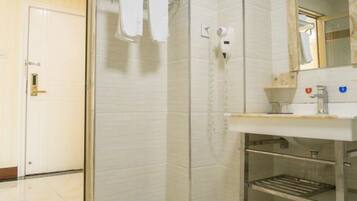 Shower, free toiletries, slippers, towels