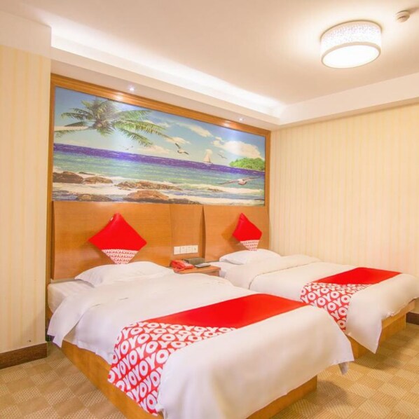 Habitación Deluxe con 2 camas individuales | Wifi gratis y ropa de cama 