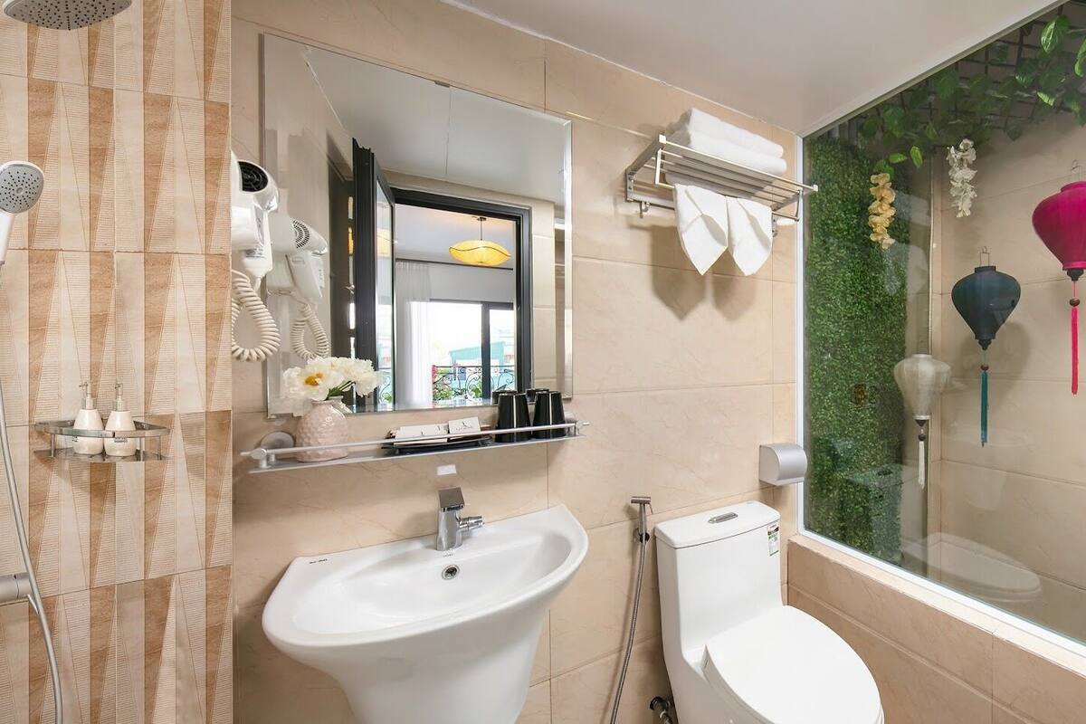 shower, rainfall showerhead, designer toiletries, hair dryer