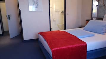 Einzelzimmer | Minibar, schallisolierte Zimmer, Babybetten, Zustellbetten