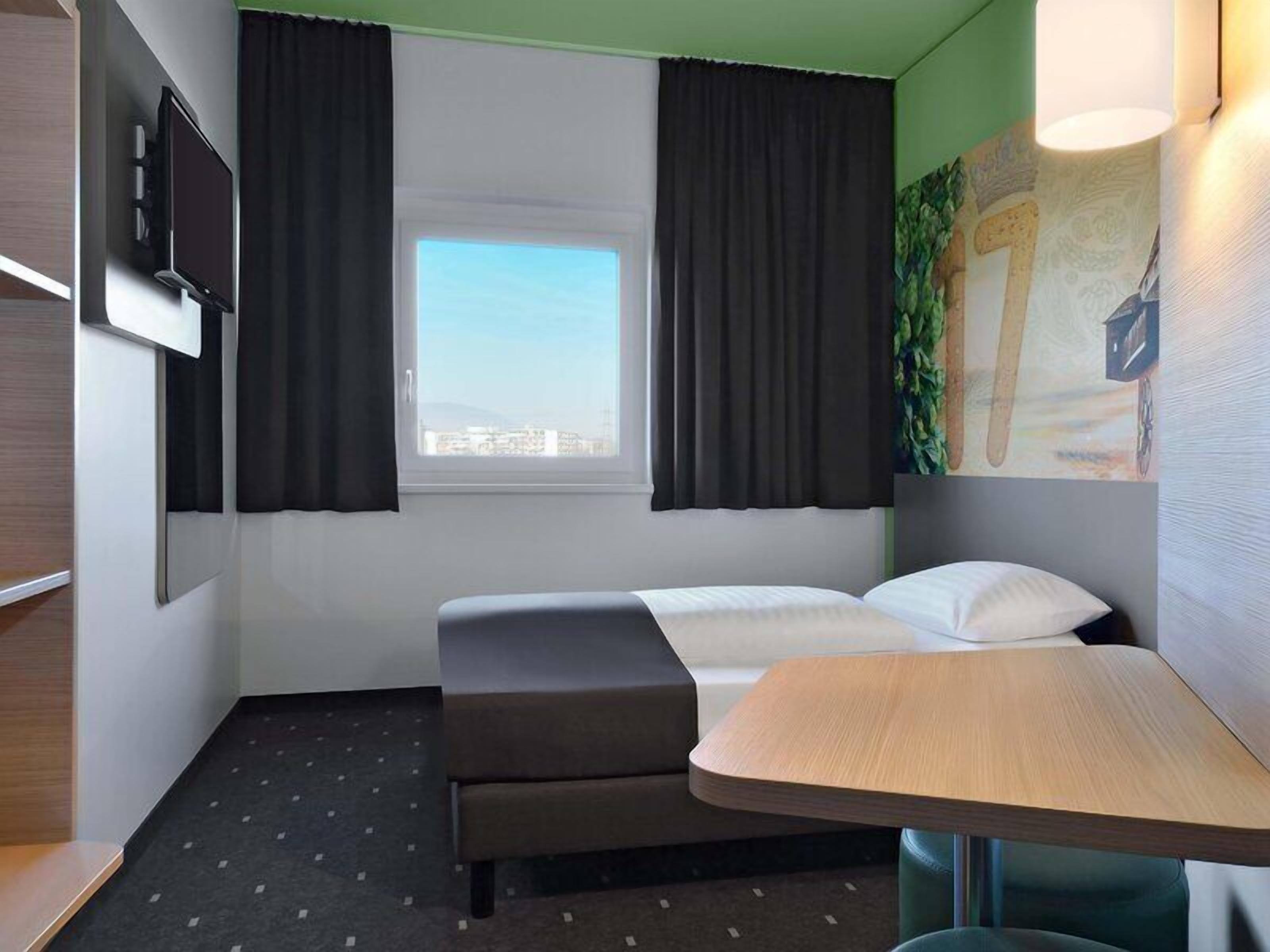 Habitación individual | Escritorio, insonorización, wifi gratis y ropa de cama 