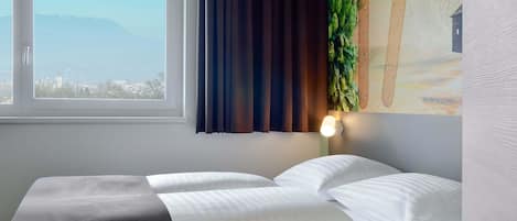 Habitación doble | Escritorio, sistema de insonorización, wifi gratis y ropa de cama