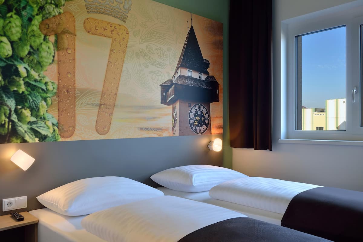 Chambre avec lits jumeaux | 1 chambre, bureau, chambres insonorisées, Wi-Fi gratuit