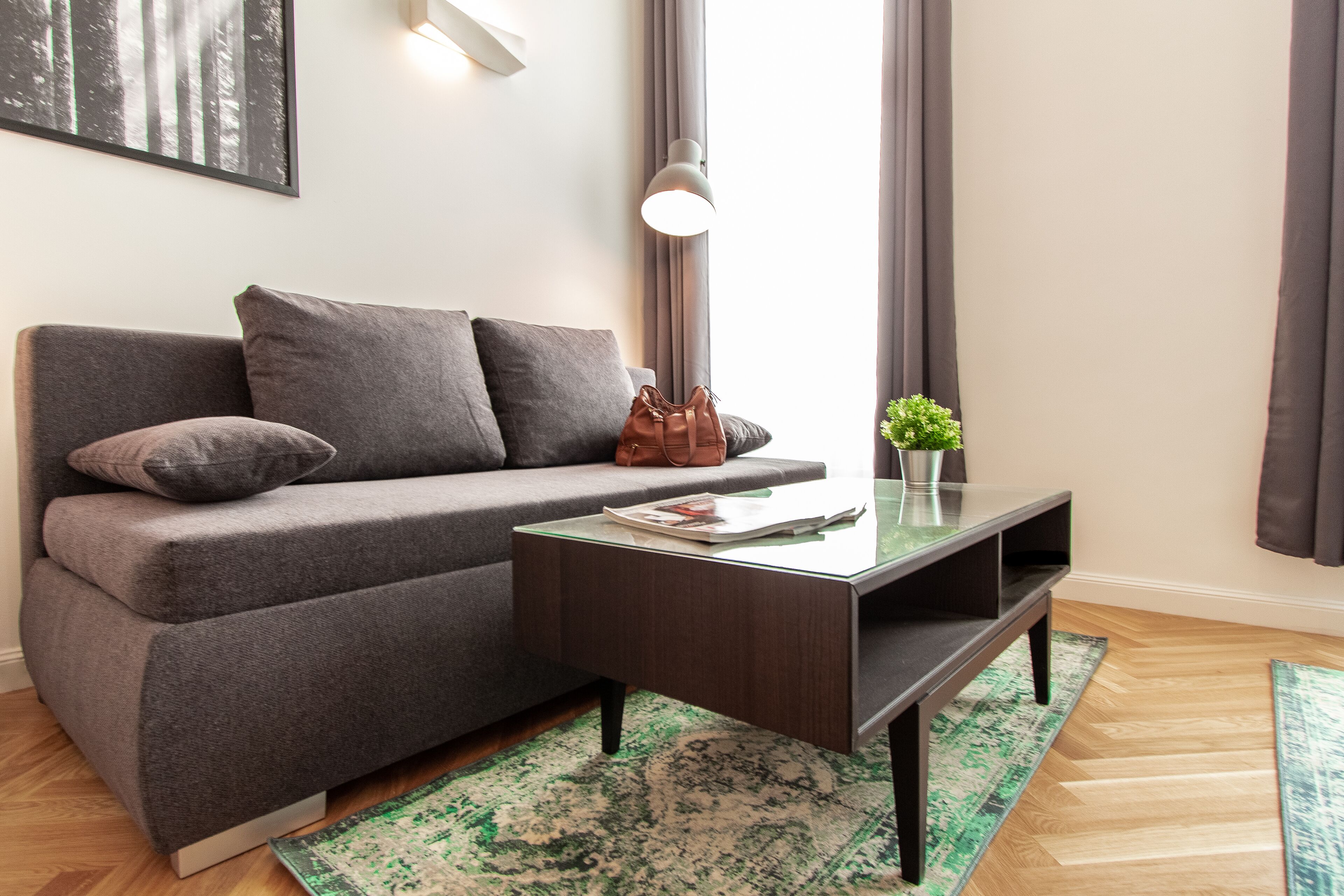 Deluxe Studio | Living area | 32-inch flat-screen TV with satellite channels, TV