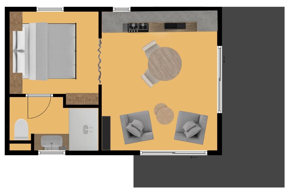 Indeling van een hotelkamer met een bed, een bureau, een bank en een bijzettafeltje.