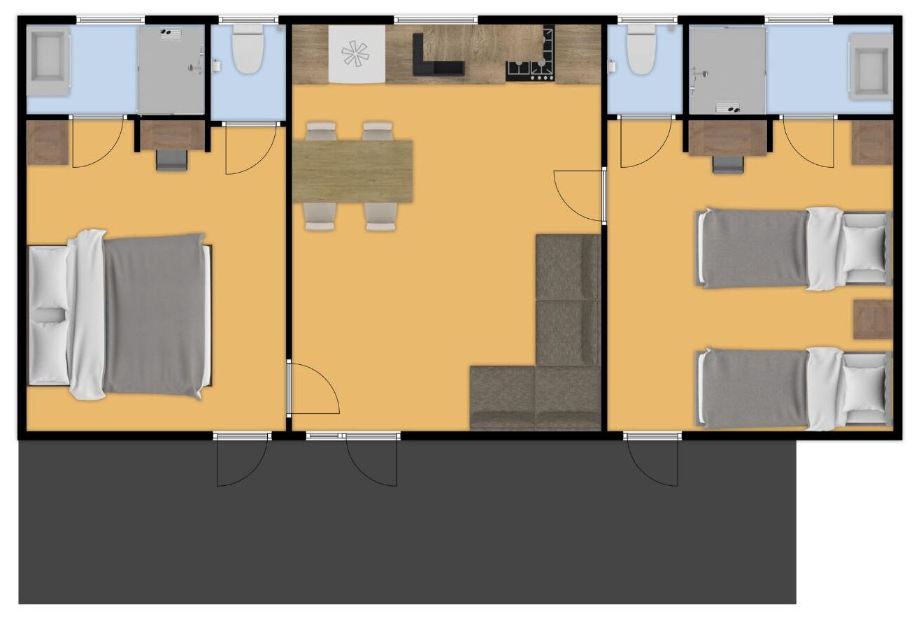 Ein Hotelzimmer mit zwei Einzelbetten, einer kleinen Sitzecke mit Tisch und Stühlen, einem Badezimmer und einer Küchenzeile.