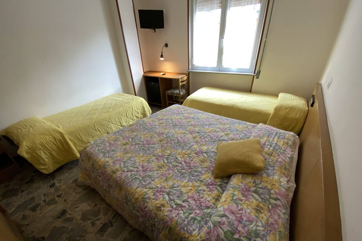 Superior Triple Room | Minibar, in-room safe, desk, cots/infant beds