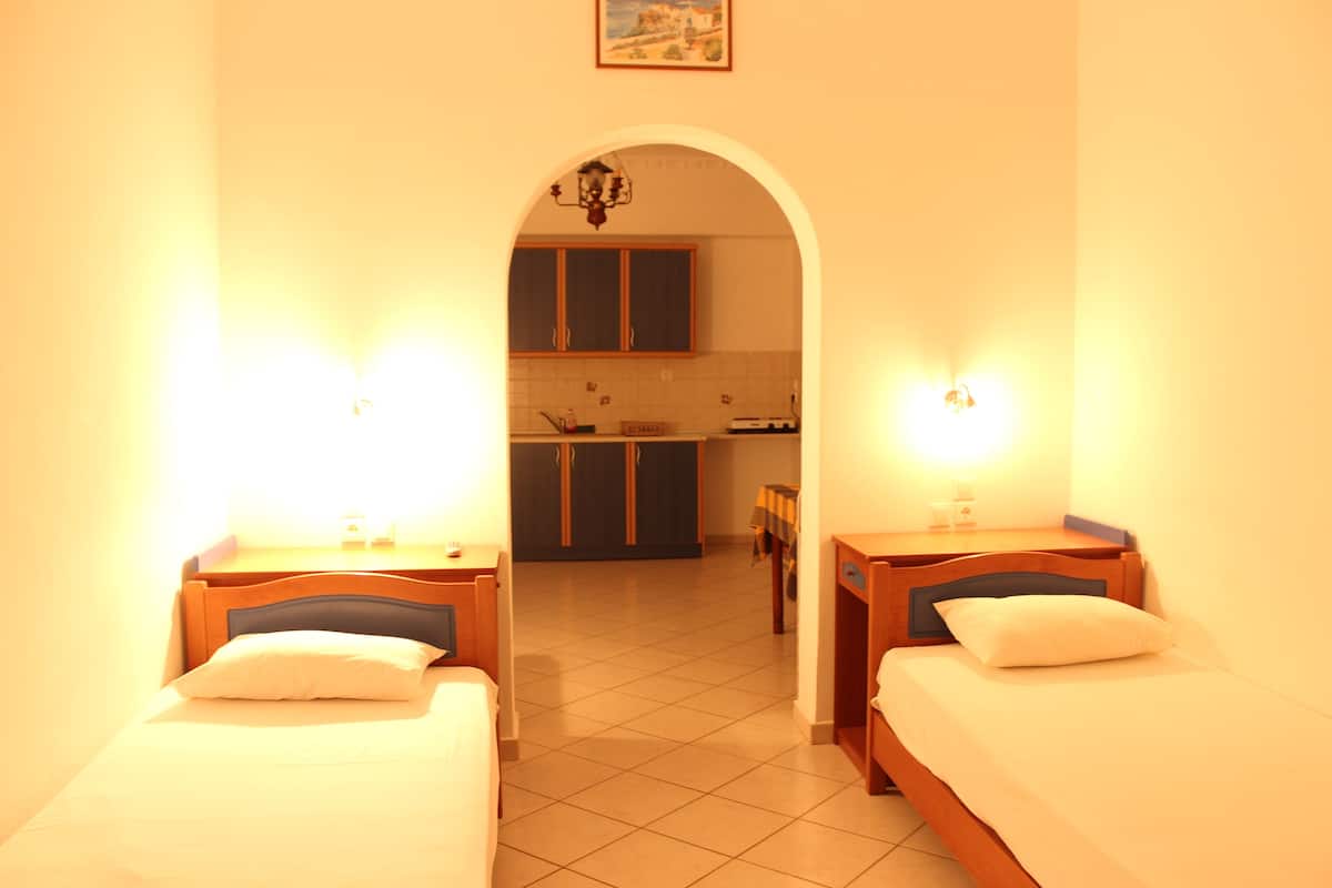Comfort Triple Room, Terrace (R118) | Laptop workspace, blackout drapes, free WiFi, bed sheets