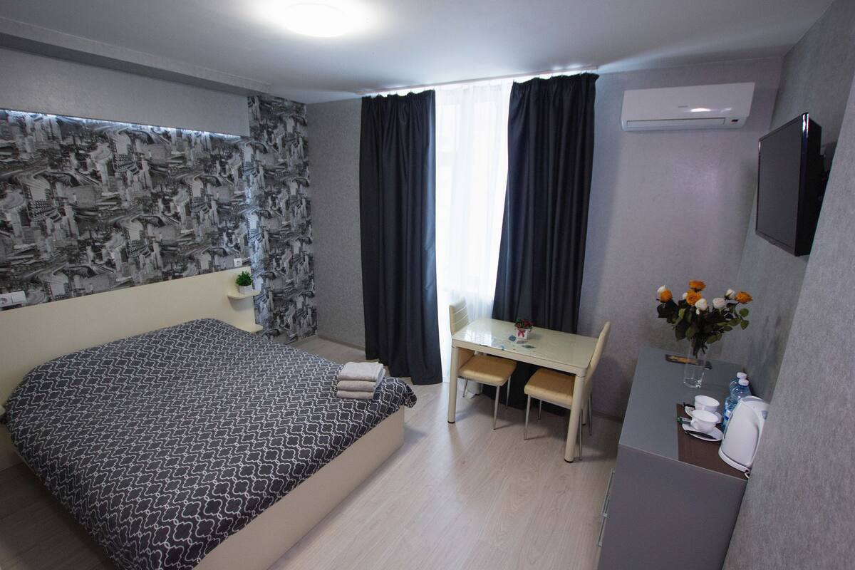 Habitación Deluxe, balcón | Ropa de cama de alta calidad, edredón y camas con efecto memoria