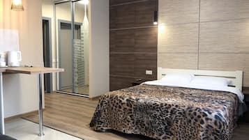 Family Studio | Premium bedding, down comforters, memory foam beds, in-room safe