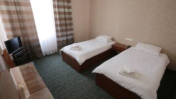 Deluxe Twin Room | 1 bedroom, minibar, in-room safe, blackout drapes