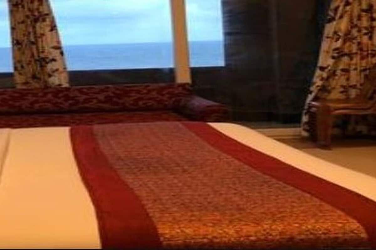 Deluxe Room (Sea Facing) | In-room safe, desk, laptop workspace, iron/ironing board