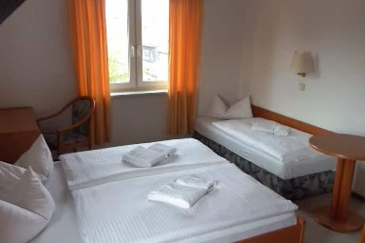 triple room | blackout curtains, iron/ironing board, cots/infant beds, free wifi