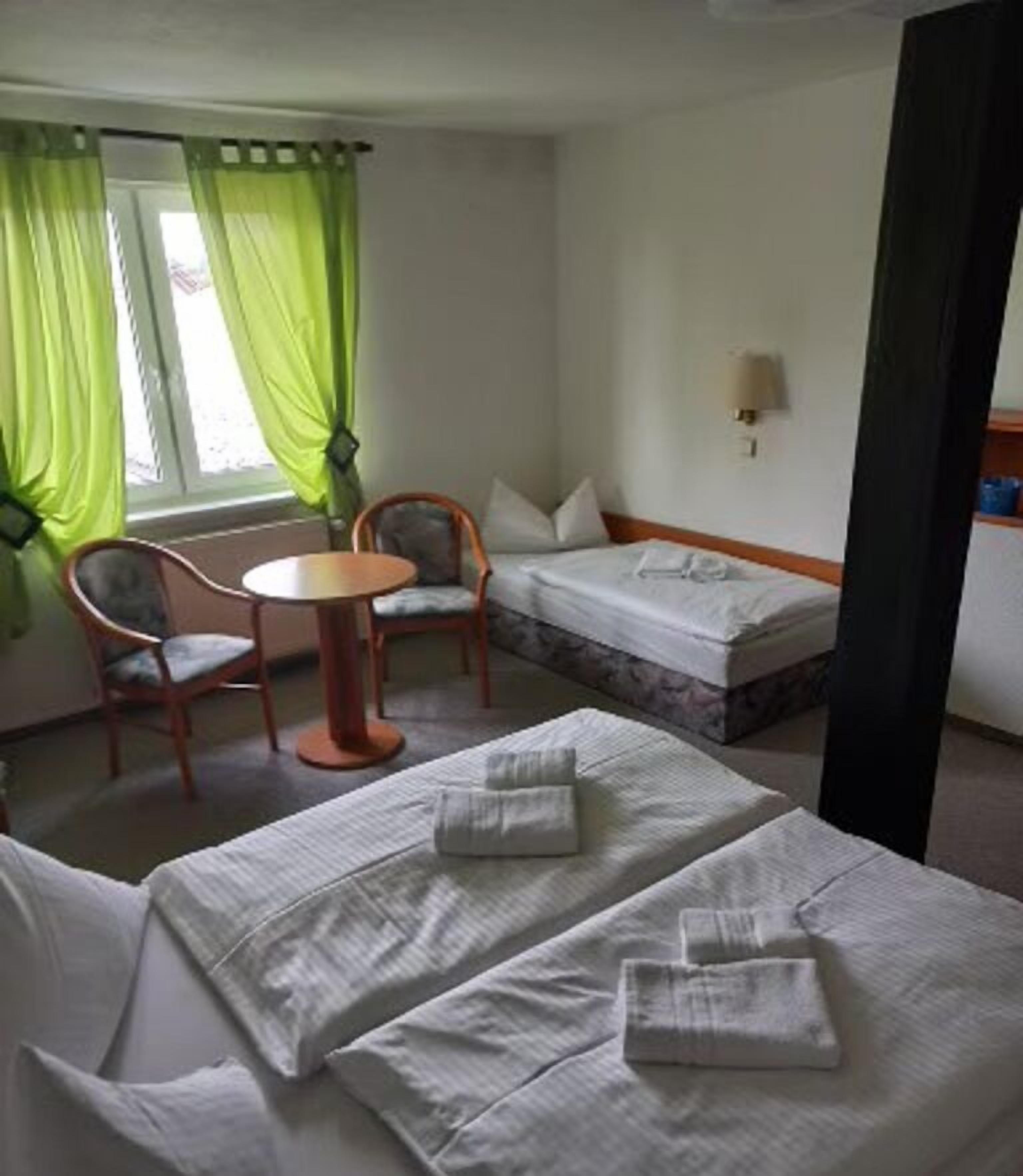 triple room | blackout curtains, iron/ironing board, cots/infant beds, free wifi