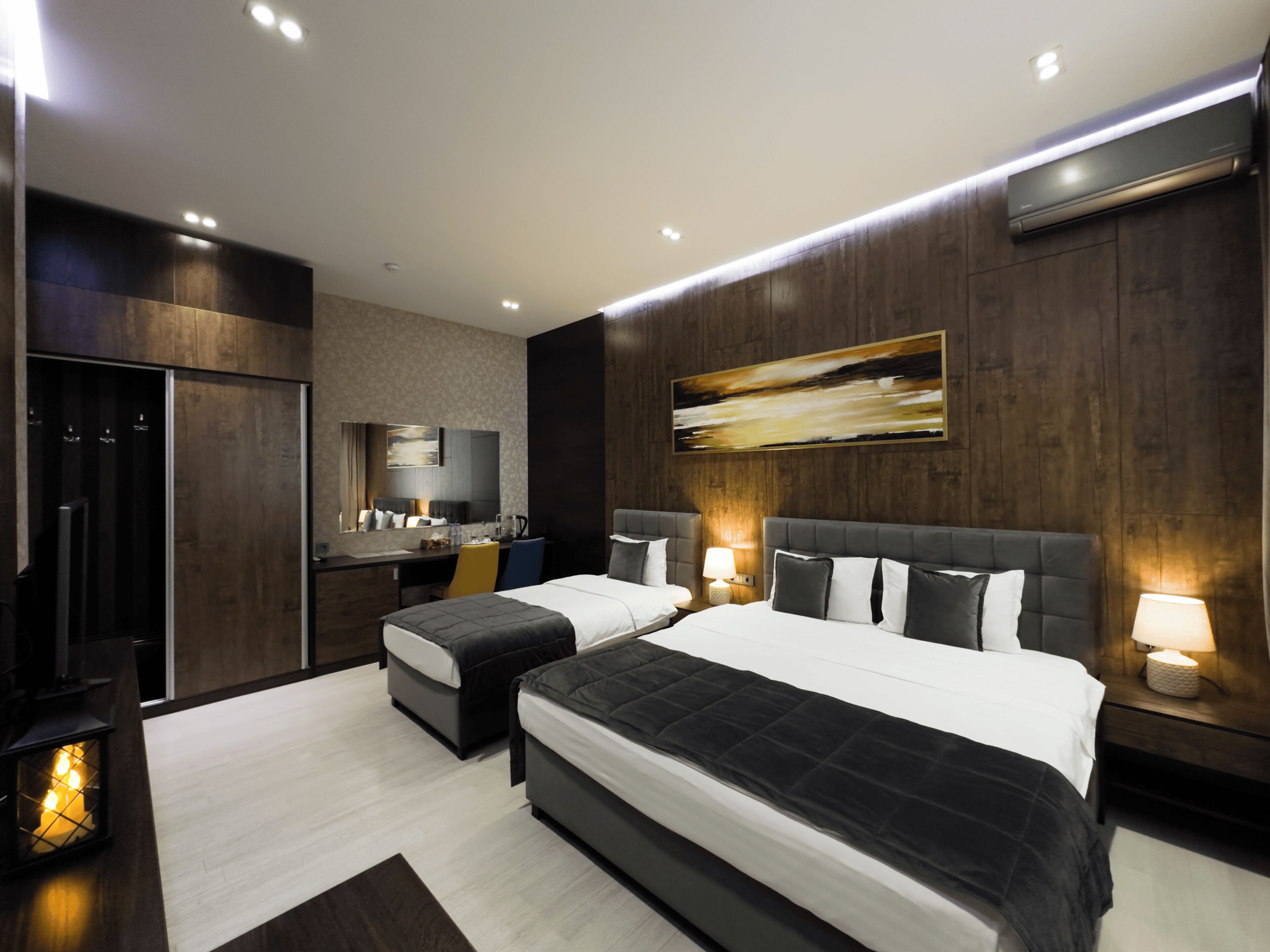 Deluxe Triple Room | Premium bedding, in-room safe, individually furnished, desk