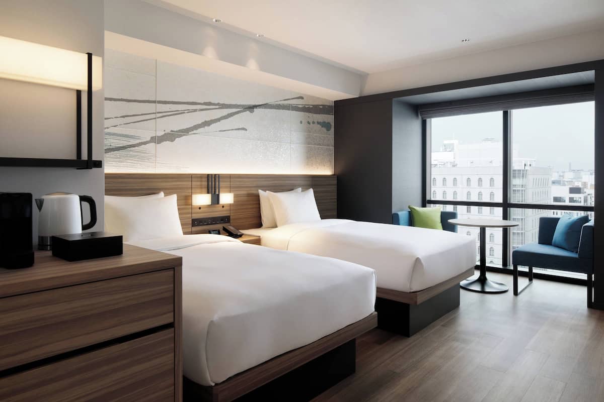 Room, 2 Single Beds, Corner (Collaboration Doubles) | 1 bedroom, pillow-top beds, in-room safe, desk