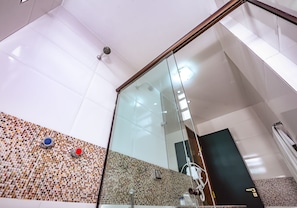 Shower, designer toiletries, hair dryer, bidet