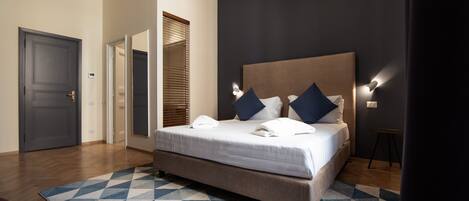 Superior tweepersoonskamer | Luxe beddengoed, donsdekens, pillowtop-bedden, een kluis op de kamer