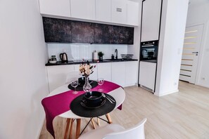 Superior Apartment | Living area | 40-inch LED TV with satellite channels, TV