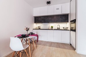Lägenhet Superior | Eget kök | Ugn, diskmaskin, kaffe- och tebryggare och grytor/köksredskap