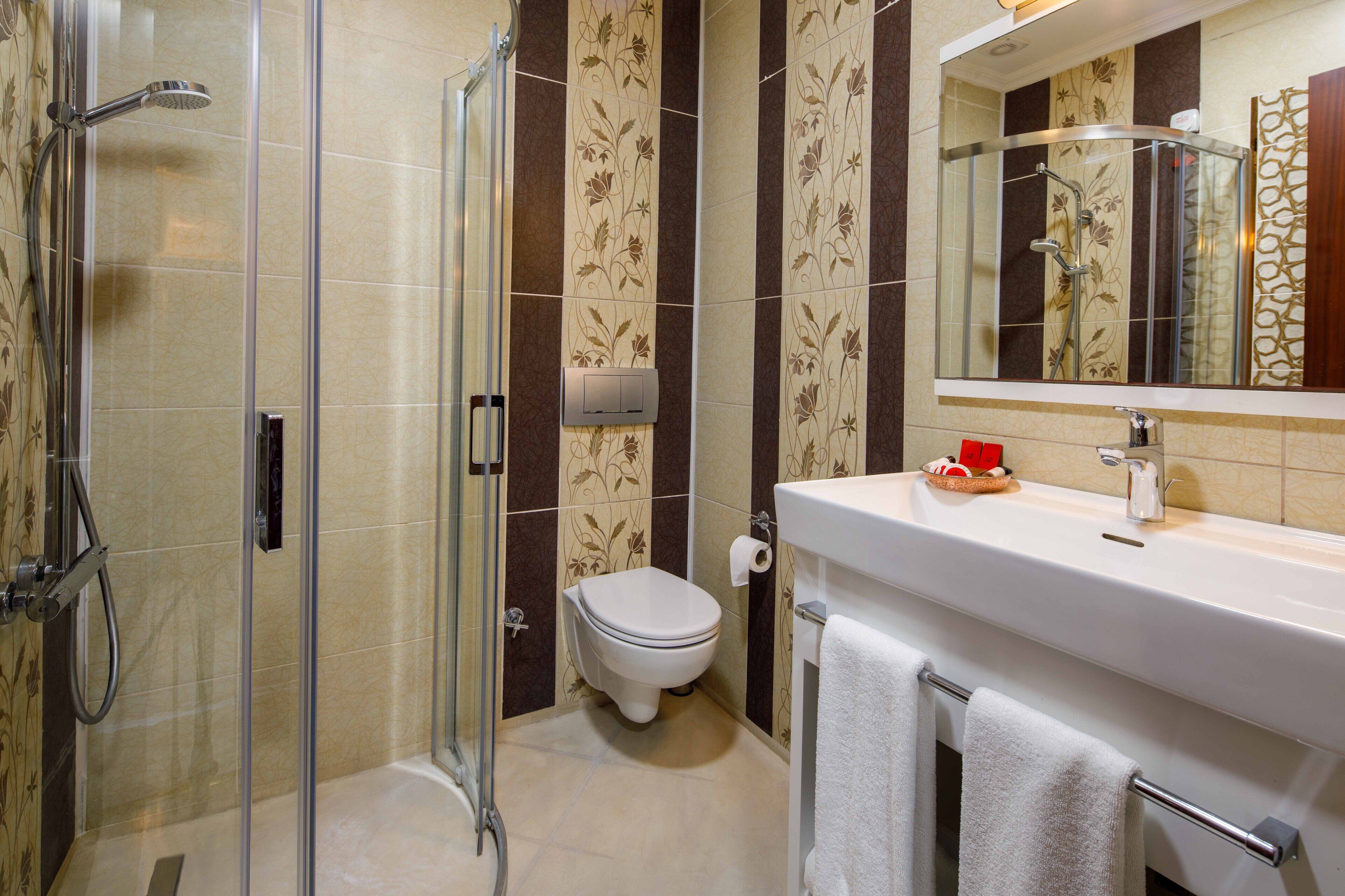 hair dryer, slippers, towels, soap