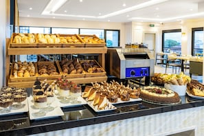 Desayuno bufé gratuito y diario