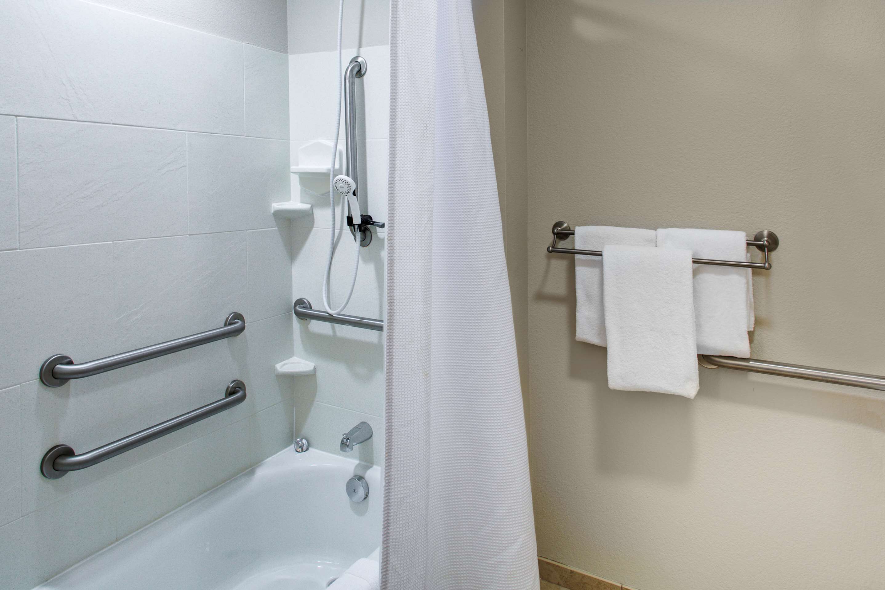 suite, 1 bedroom, accessible, bathtub | bathroom | combined shower/bathtub, designer toiletries, hair dryer, towels