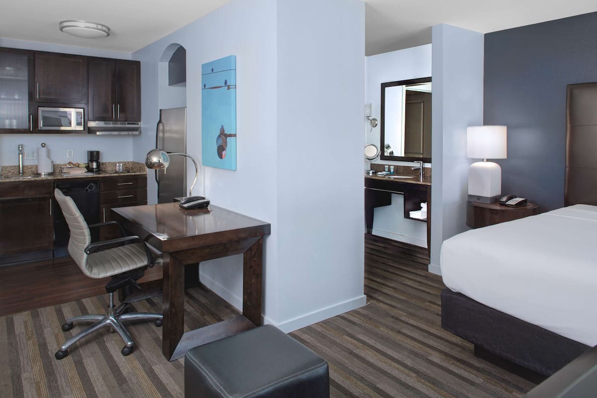 Premium bedding, pillow-top beds, desk, blackout curtains