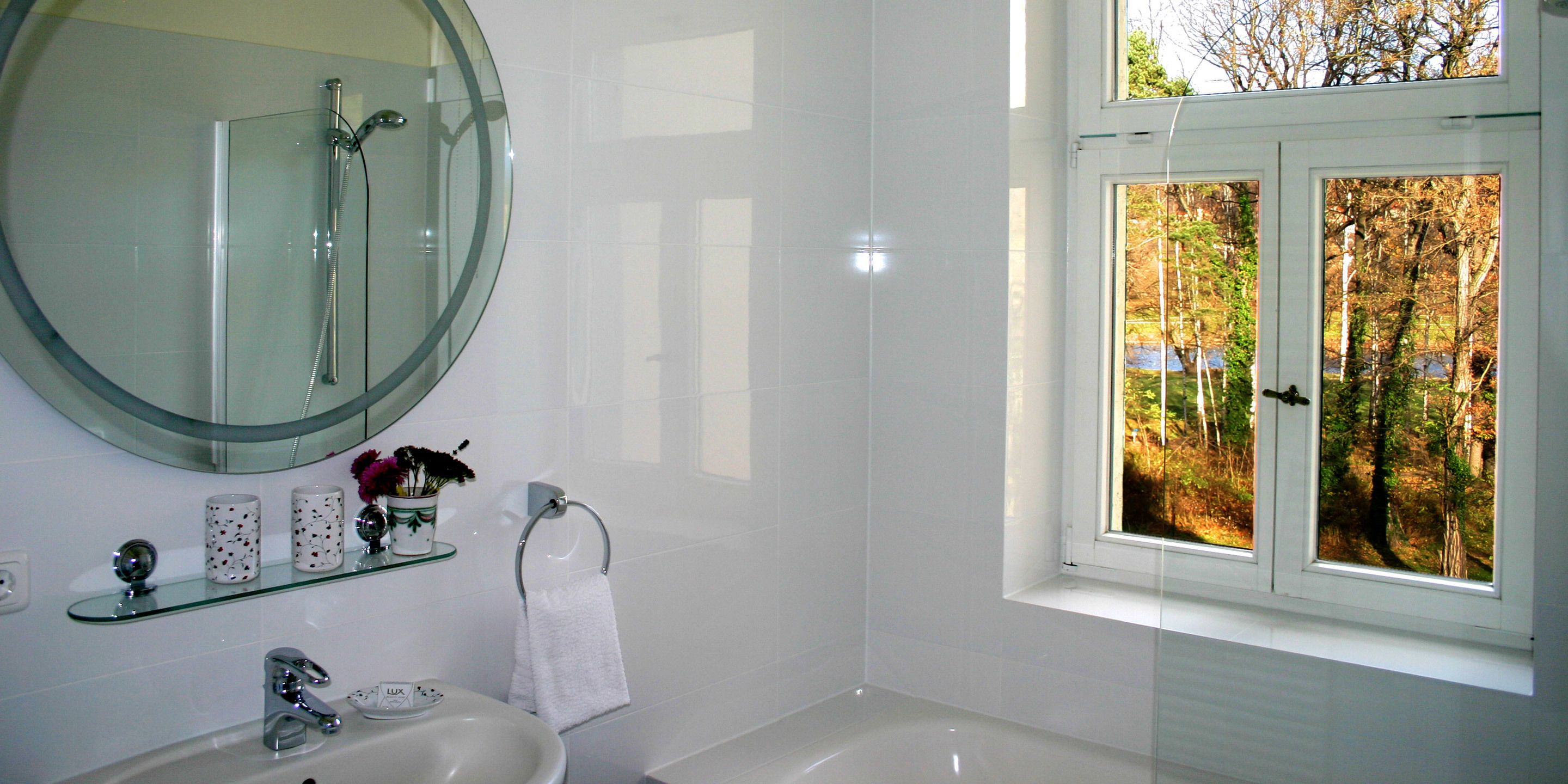 double room, river view | bathroom | free toiletries, hair dryer, towels